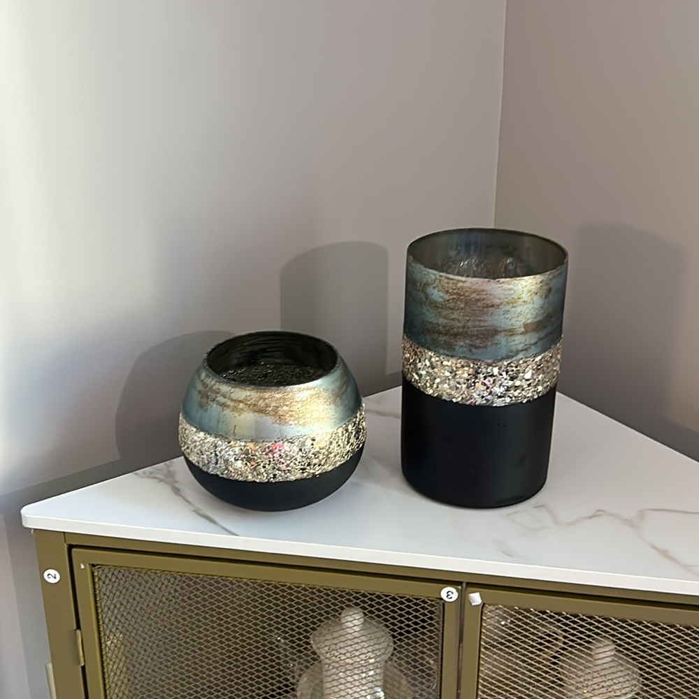 Distressed pair of teal vases